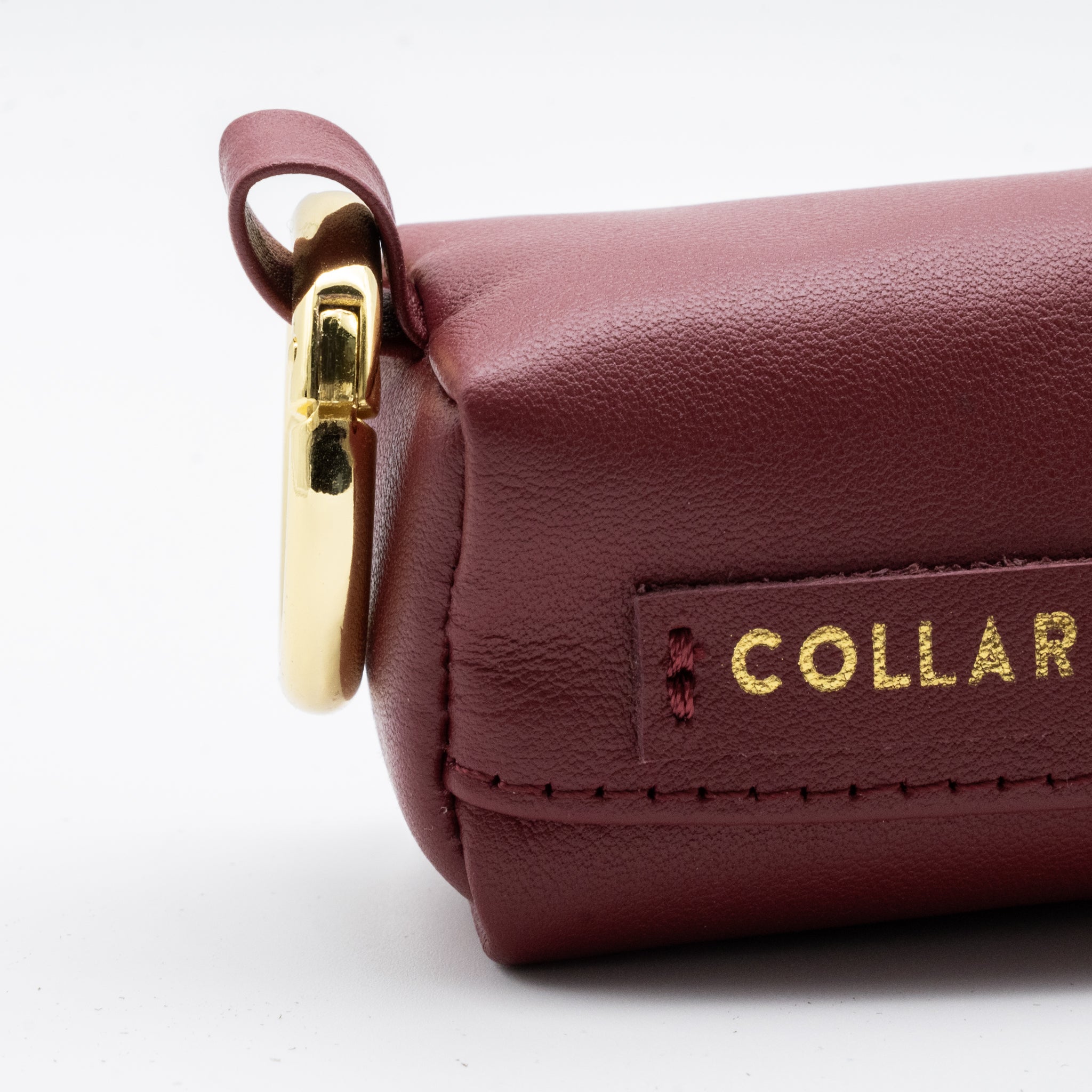 Vinröd Bajspåsehållare